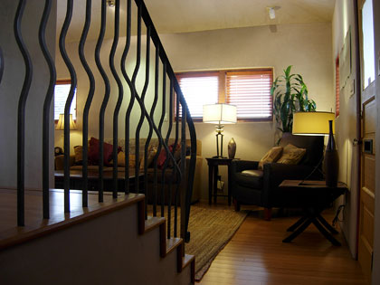 Stairs, wrought iron railing, living room